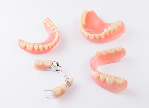 Types of dentures on a table