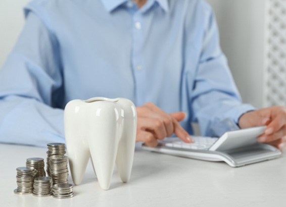 A patient calculating the cost of Invisalign