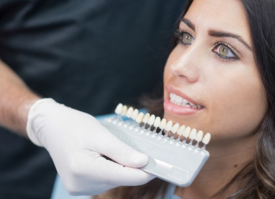 Woman at dentist’s office preparing for veneers in York 