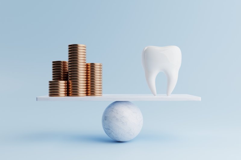 Illustration of tooth measured against coins